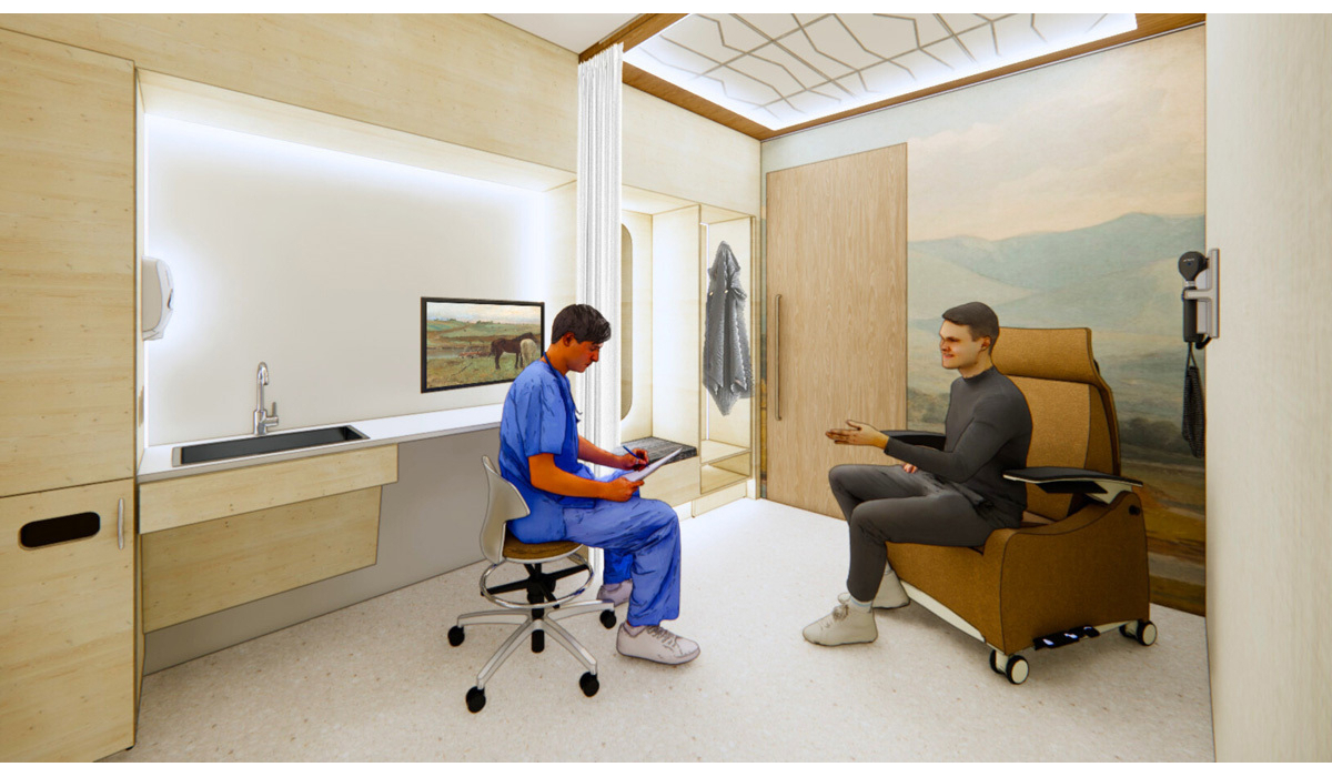 A modern healthcare room features a healthcare professional in scrubs using a tablet while speaking with a patient seated in a comfortable chair.