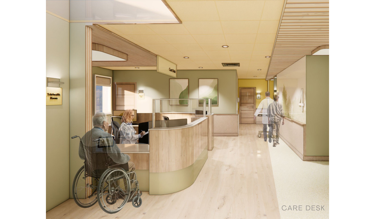 A modern healthcare reception area features a care desk, seating for patients, and a wide hallway with staff and patients navigating.