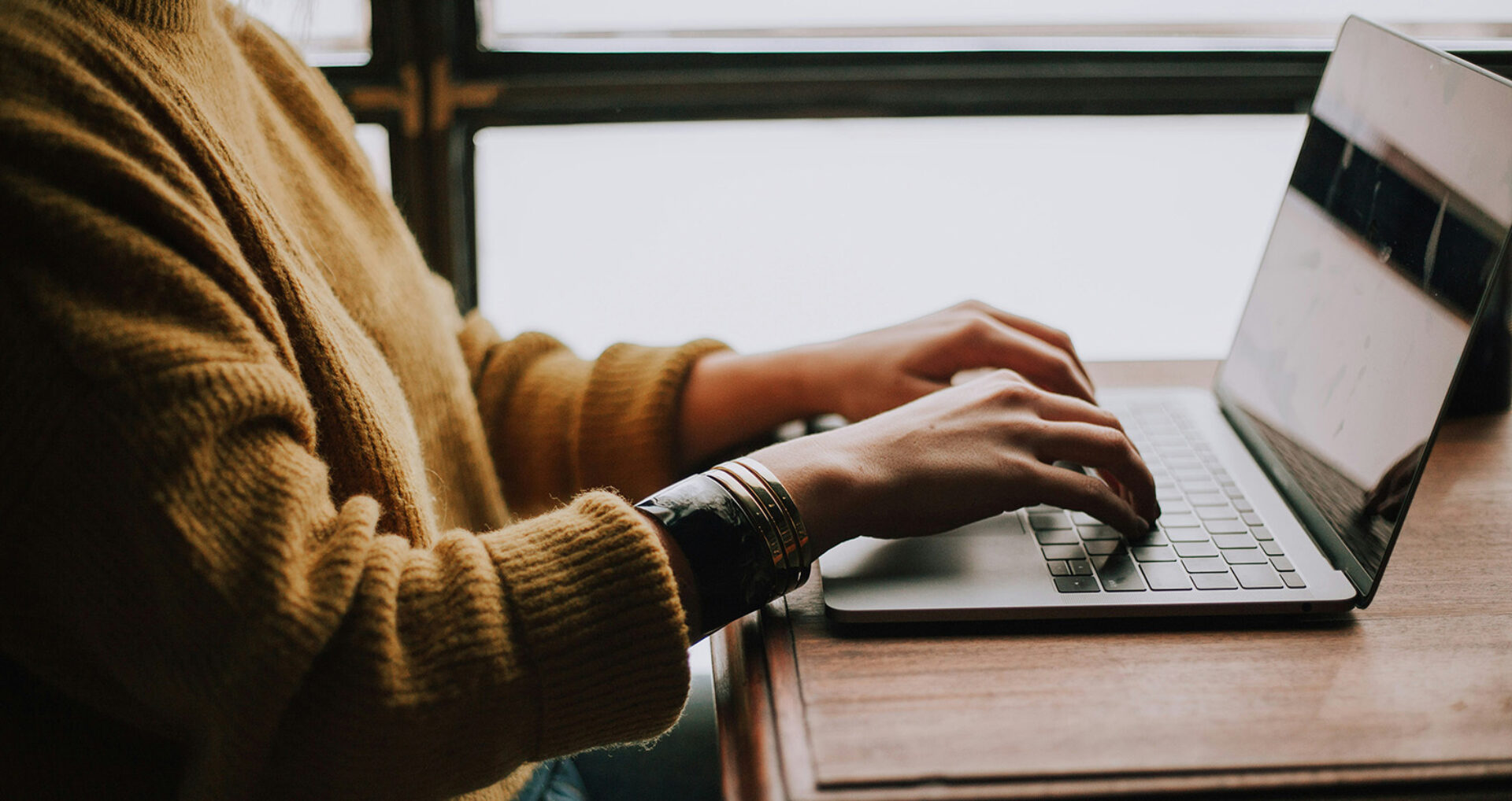 Person typing at computer ncidq prep